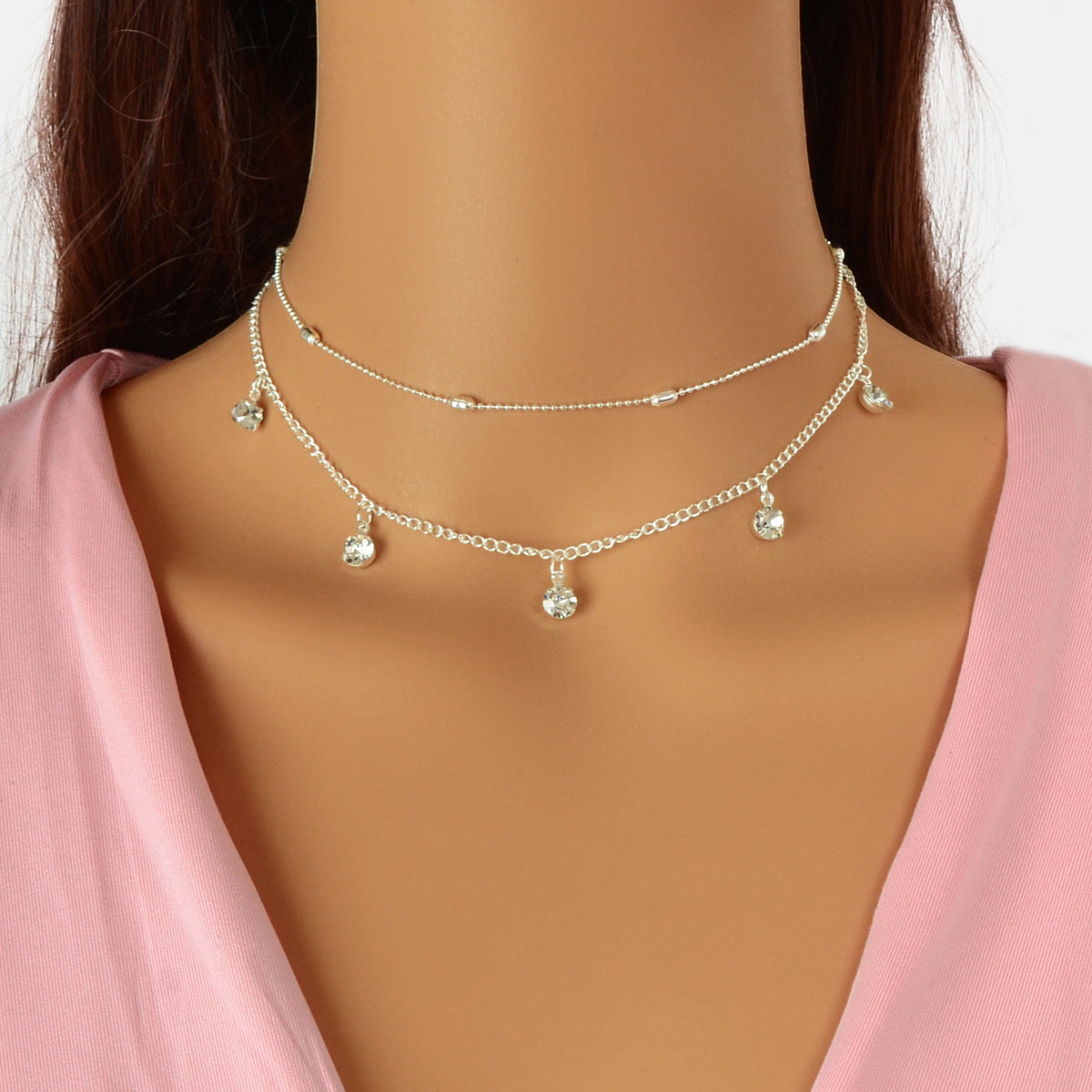 Embrace the allure of the Dainty Adjustable Layer Gold Silver Chain Rhinestone Charm Clavicle Necklace. This exquisite piece effortlessly enhances your natural elegance, inviting you to explore your unique beauty. With its delicate layers and shimmering charms, it serves as a reminder that true empowerment lies in self-expression and confidence. Adorn yourself with this enchanting necklace and celebrate the magic of your individuality.