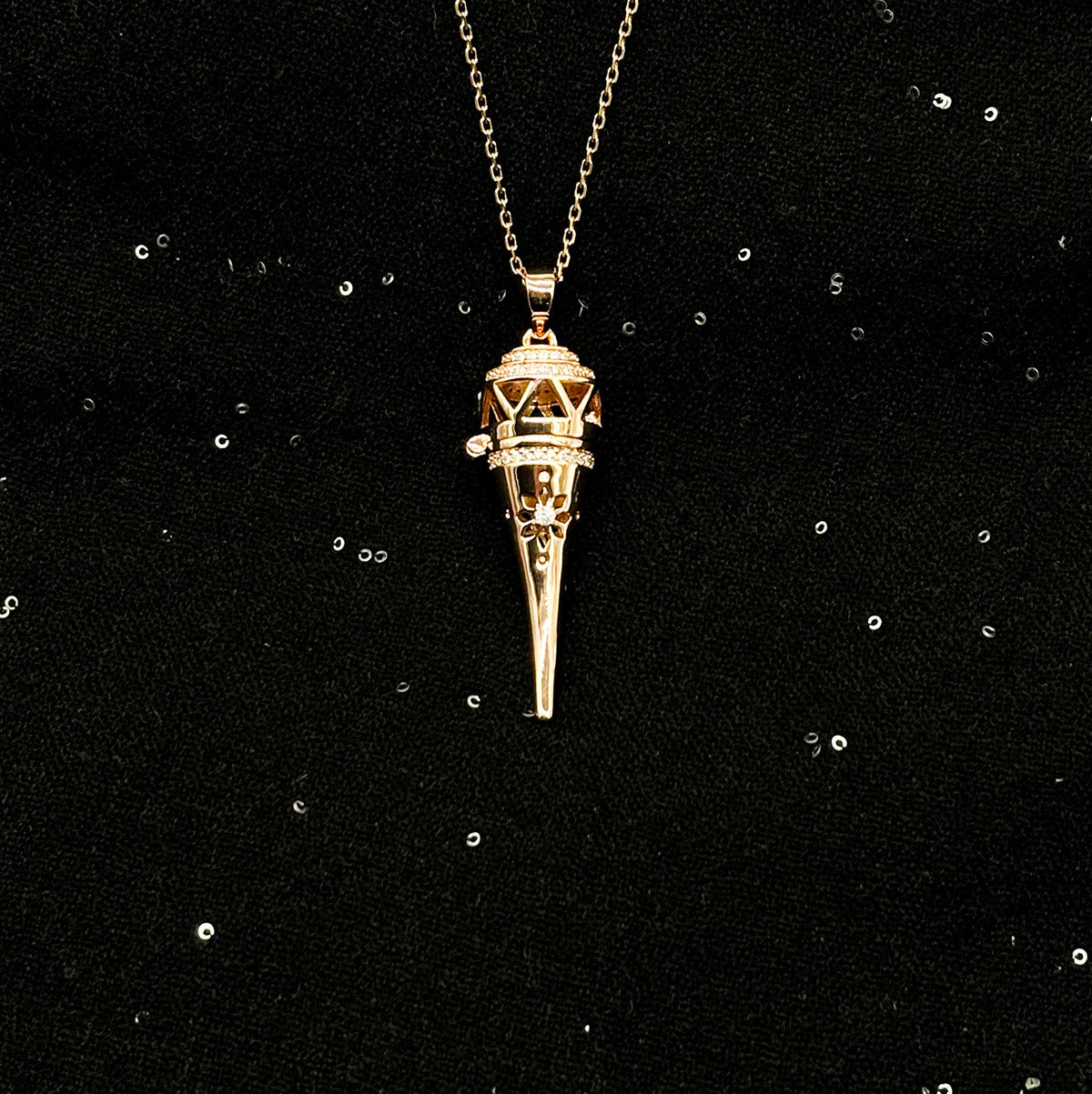 Embrace the allure of self-discovery with the Cone Aroma Necklace. This exquisite 18K gold-plated pendant cradles your chosen essential oil, inviting you to carry your personal ritual wherever you go. Let the delicate scent uplift your spirit, center your energy, and transform ordinary moments into a celebration of your essence. Adorn yourself with elegance and intention, and experience the subtle power of aroma as it whispers to your soul.
