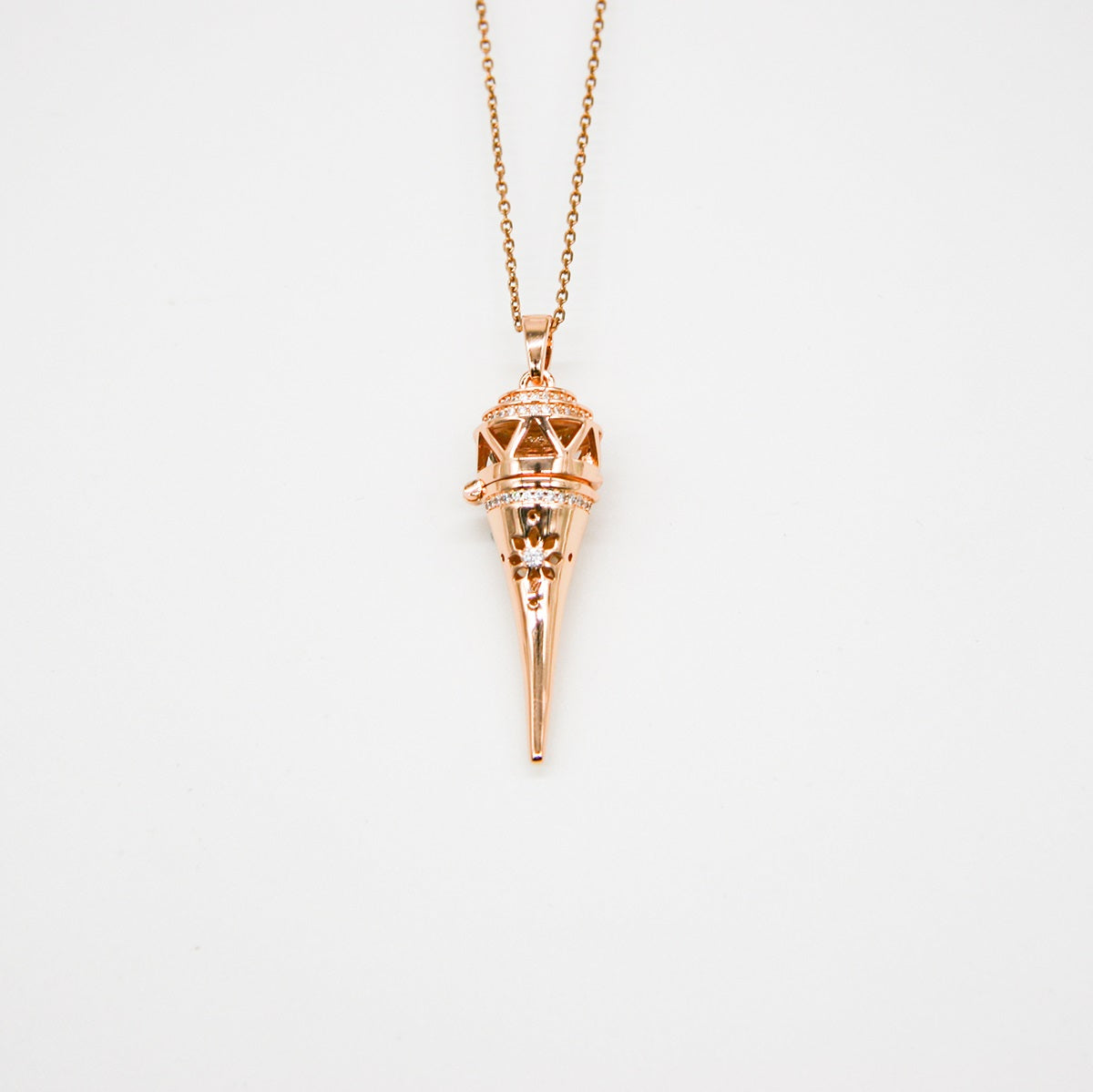 Discover the allure of self-expression with the Cone Aroma Necklace. This exquisite 18K gold-plated pendant invites you to carry your favorite essential oils, transforming every moment into a personal ritual of serenity and empowerment. Embrace your journey of self-discovery and let the delicate design enhance your natural elegance, reminding you to nurture your spirit wherever life takes you.