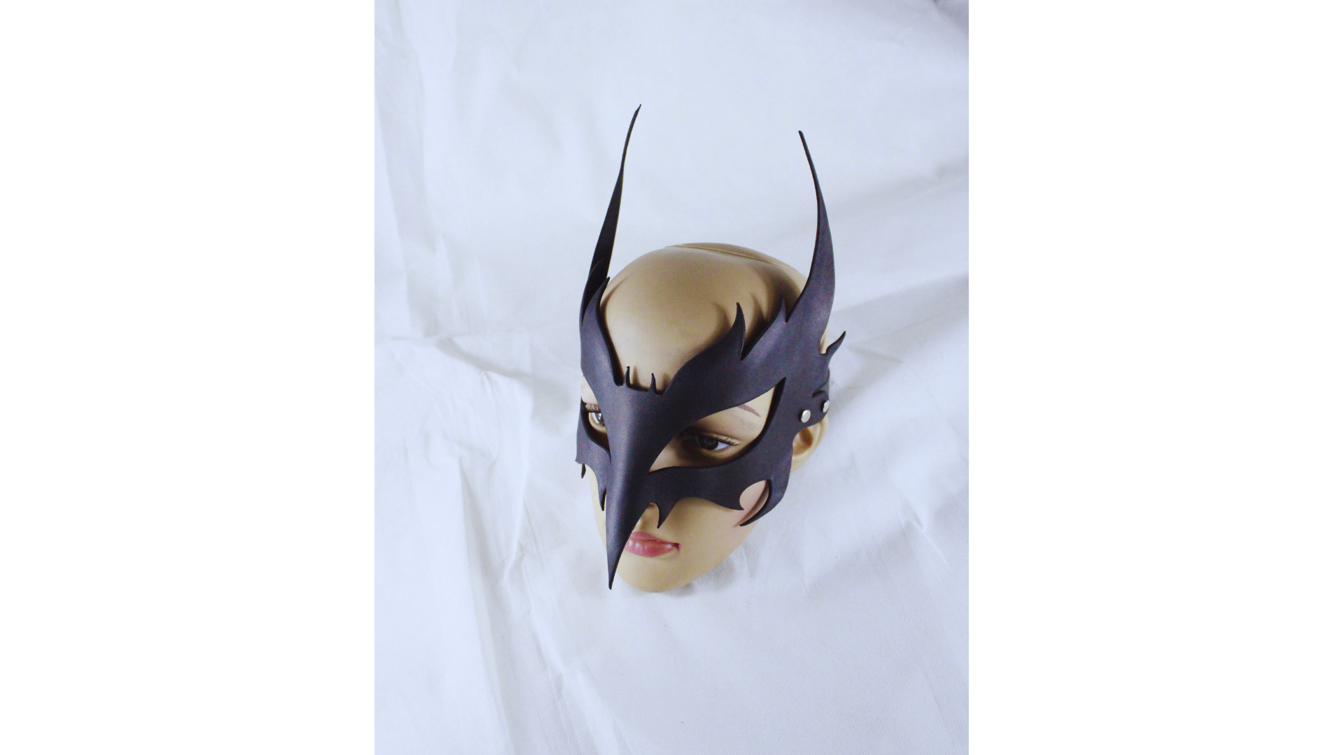 The Horned Leather Ritual Mask, adorned with elongated horns and intricate etching, invites you to embrace your inner power and allure. Its sculptural design transforms your presence, allowing you to explore the depths of your identity with elegance and confidence. Perfect for expressive moments, this mask becomes a canvas for self-discovery, encouraging you to step boldly into your unique narrative.