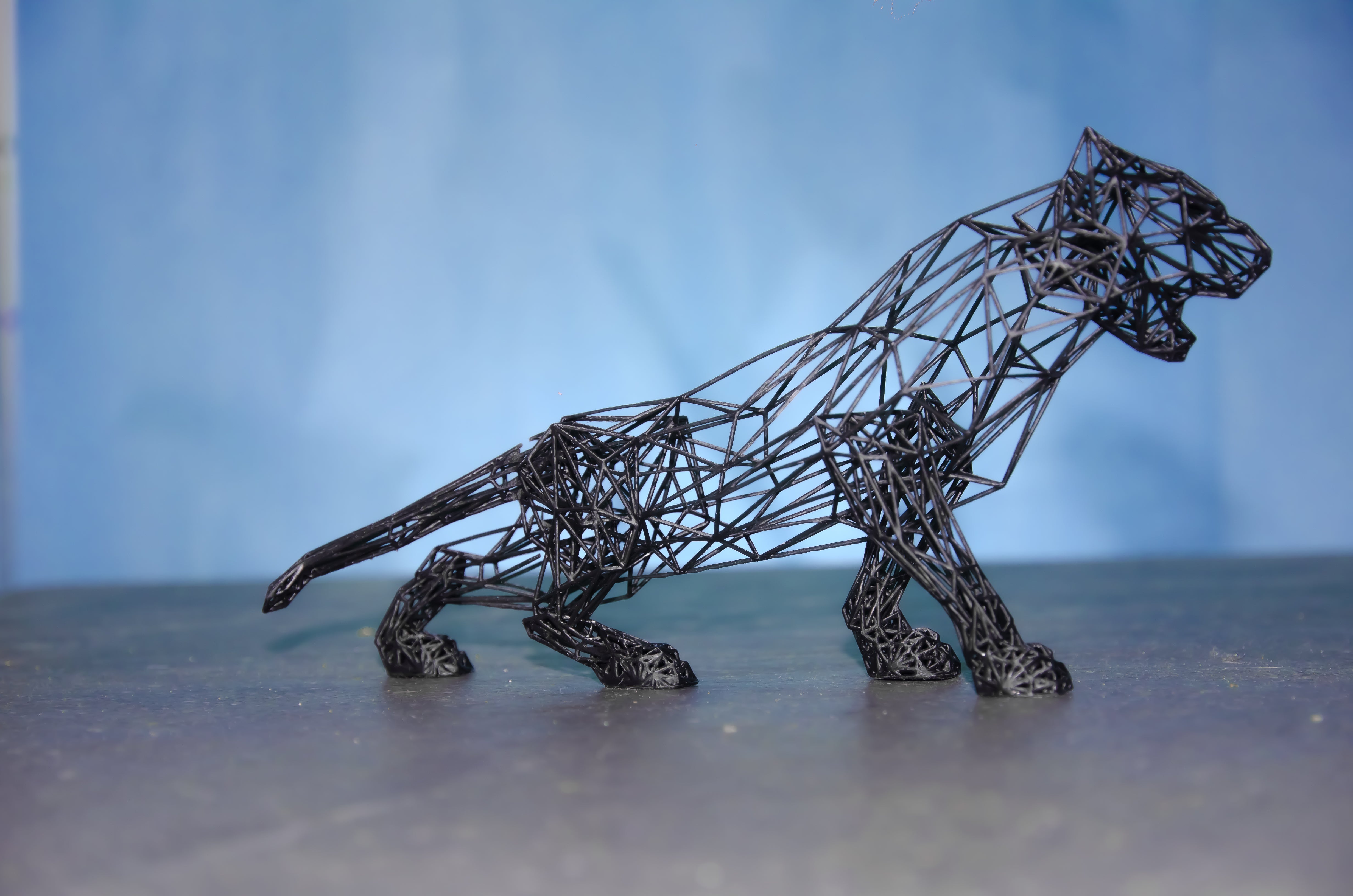 Embrace the allure of self-discovery with the Majestic Jaguar Sculpture, a captivating piece that embodies elegance and strength. Its intricate 3D wireframe design invites admiration, transforming any space into a sanctuary of sophistication. Allow this exquisite artwork to inspire your journey, celebrating the beauty of nature and the power within you. Let it grace your home, reminding you of the fierce elegance that resides in us all.