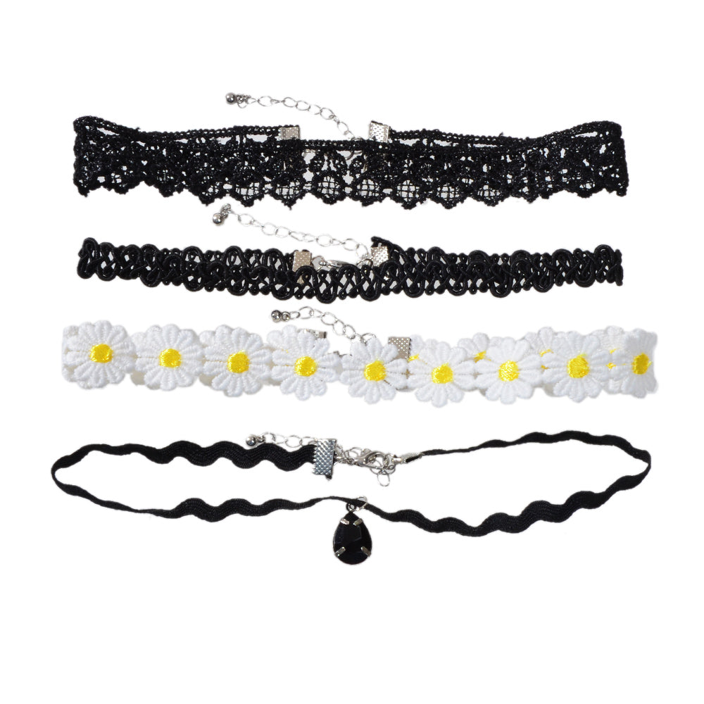 Embrace your bold self-expression with this Gothic Floral Choker Set. Featuring four exquisite designs in black and white, each choker beautifully complements your unique style. The delicate floral patterns and elegant teardrop pendant invite you to explore your individuality, celebrating the beauty of self-discovery. Perfect for those who appreciate the allure of retro punk aesthetics, these chokers are a statement of confidence and grace.