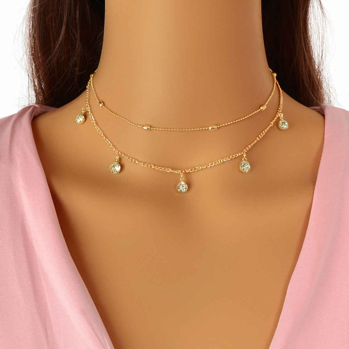 Adorn your neckline with the Dainty Adjustable Layer Gold Silver Chain Rhinestone Charm Clavicle Necklace, a delicate blend of elegance and allure. This layered masterpiece captures the essence of effortless beauty, inviting you to embrace your unique style. Each shimmering rhinestone charm dances gracefully, reflecting your inner light and celebrating your individuality. Perfect for any occasion, this necklace is a gentle reminder of the magic that lies within self-discovery and self-love.