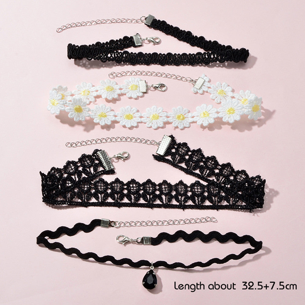 Embrace your bold self-expression with this captivating Gothic Floral Choker Set. Featuring a harmonious blend of black and white designs, each piece invites you to explore your unique style. Perfect for adding a touch of retro punk elegance to any outfit, these chokers celebrate individuality and the beauty of self-discovery. Wear them with confidence and let your personality shine through.