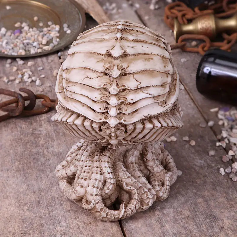 Embrace the allure of the unknown with the Mythological Resin Statue, a captivating ode to Cthulhu's enigmatic charm. This exquisite piece invites you to explore the depths of your imagination and adorn your space with a touch of mystique. Its intricate design and high-quality craftsmanship reflect a celebration of individuality and the beauty of self-discovery. Let this striking statue inspire your journey into the realms of fantasy, where every glance ignites curiosity and wonder.
