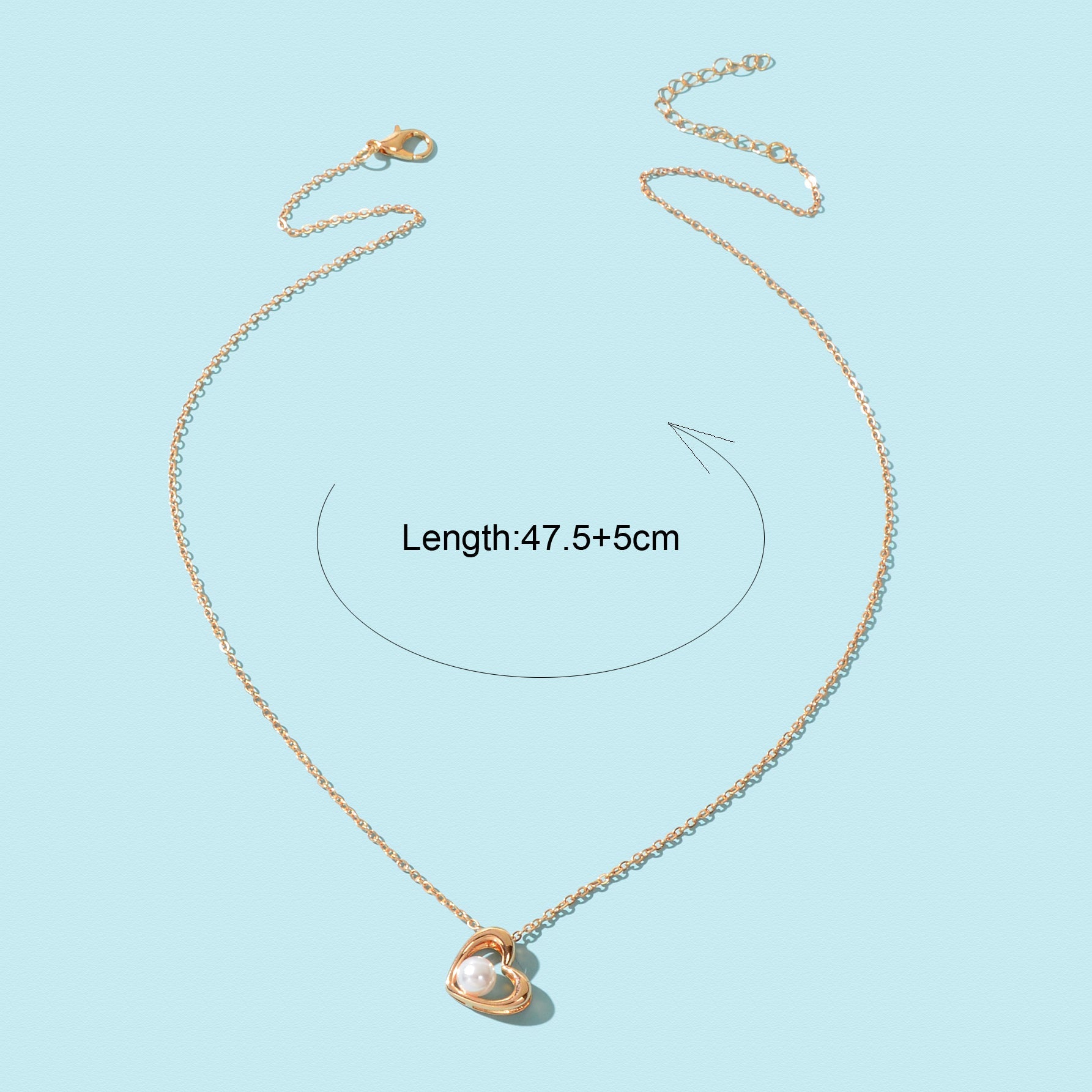 Embrace your elegance with this delicate golden chain necklace, adorned with a heart pendant and imitation pearl decor. Perfect for daily wear, it adds a touch of romance to any outfit. Gift it to yourself or a cherished one, celebrating the beauty of connection and self-love. Let each moment shine with this timeless piece from Passion Beyond the Veil.